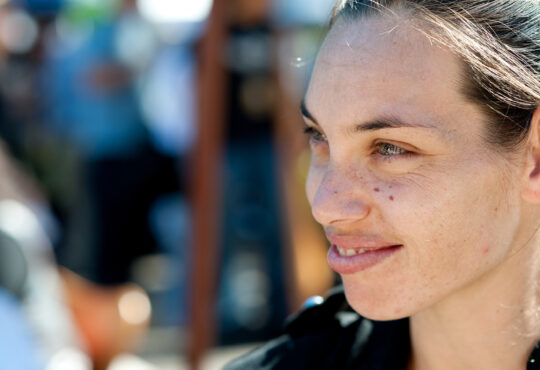 Smiling young Aboriginal woman in profile